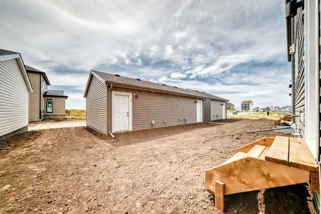 277 Heirloom Way Se, Calgary, AB - Outdoor With Exterior