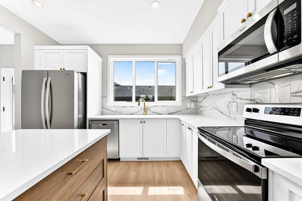 277 Heirloom Way Se, Calgary, AB - Indoor Photo Showing Kitchen With Upgraded Kitchen