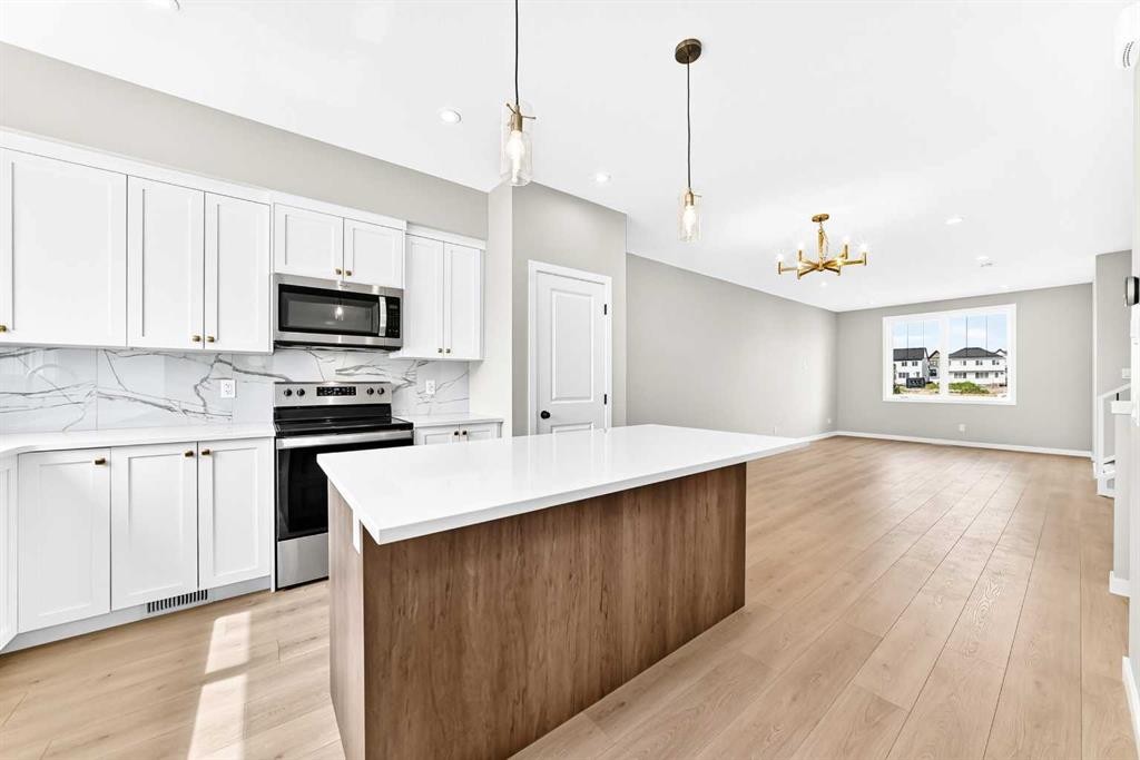 277 Heirloom Way Se, Calgary, AB - Indoor Photo Showing Kitchen With Upgraded Kitchen