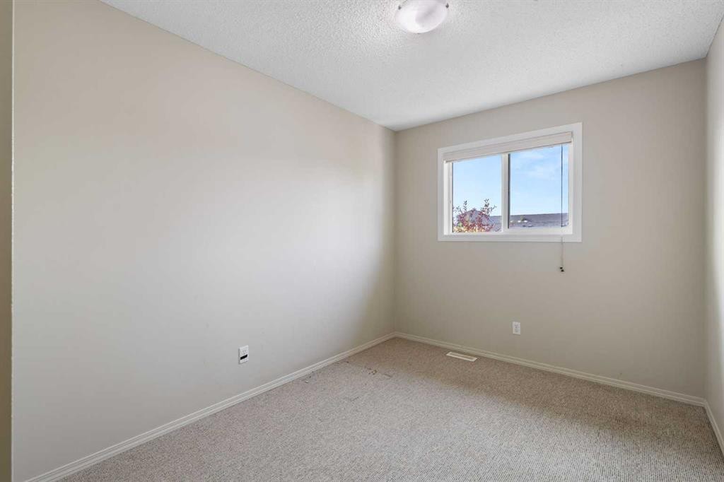 17 Panatella Villas Nw, Calgary, AB - Indoor Photo Showing Other Room