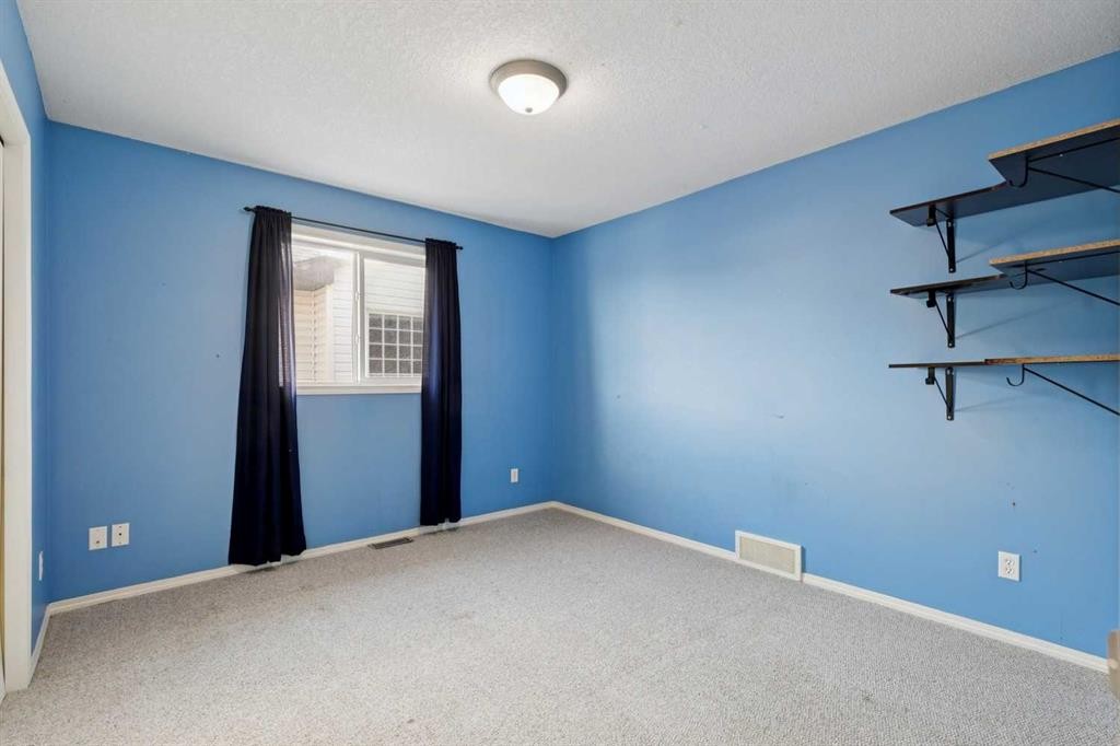 184 Cimarron Park Circle, Okotoks, AB - Indoor Photo Showing Other Room