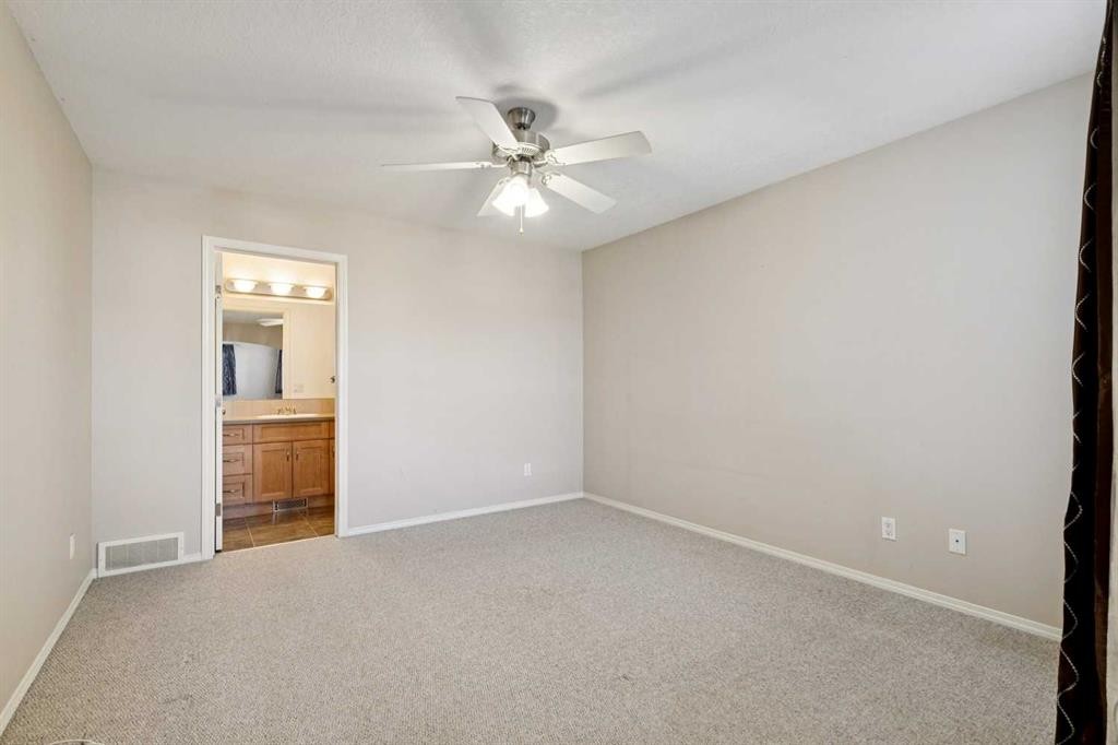 184 Cimarron Park Circle, Okotoks, AB - Indoor Photo Showing Other Room