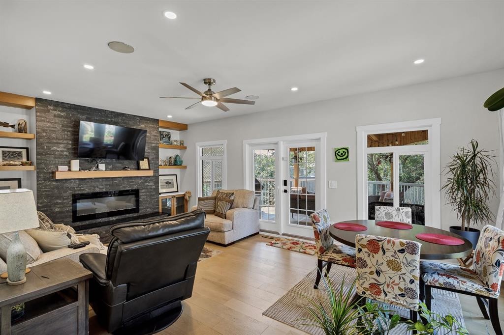 179 Capri Avenue Nw, Calgary, AB - Indoor Photo Showing Living Room With Fireplace
