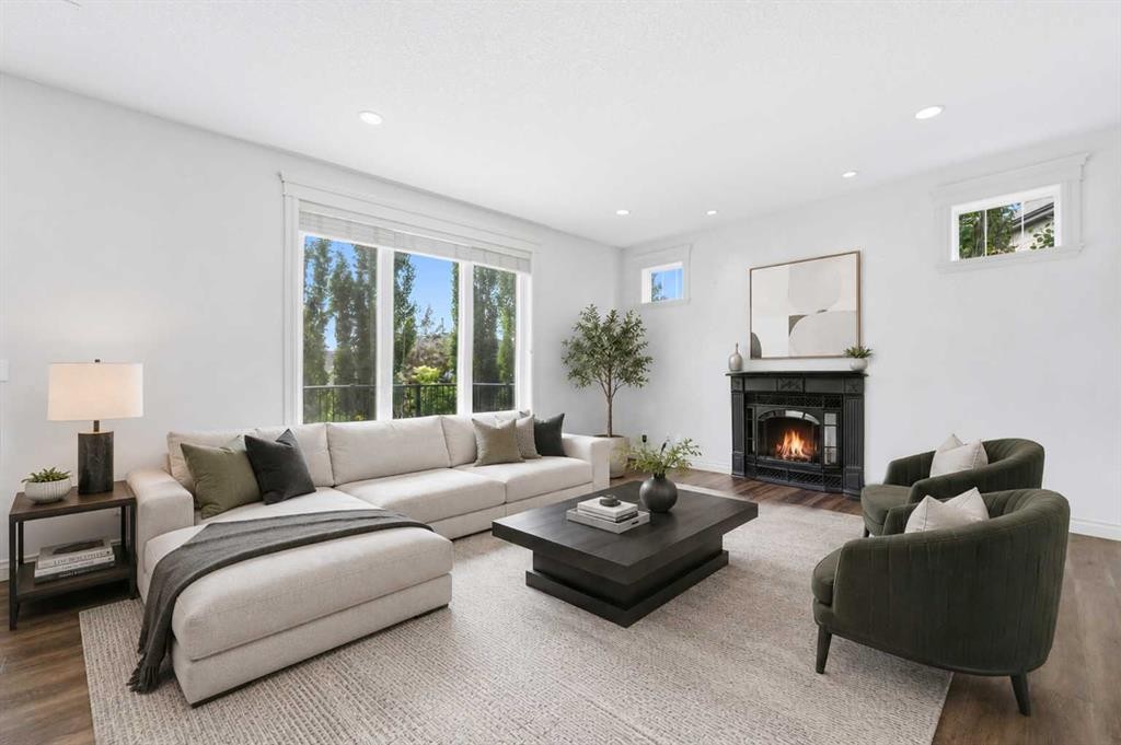 68 Auburn Sound Terrace Se, Calgary, AB - Indoor Photo Showing Living Room With Fireplace