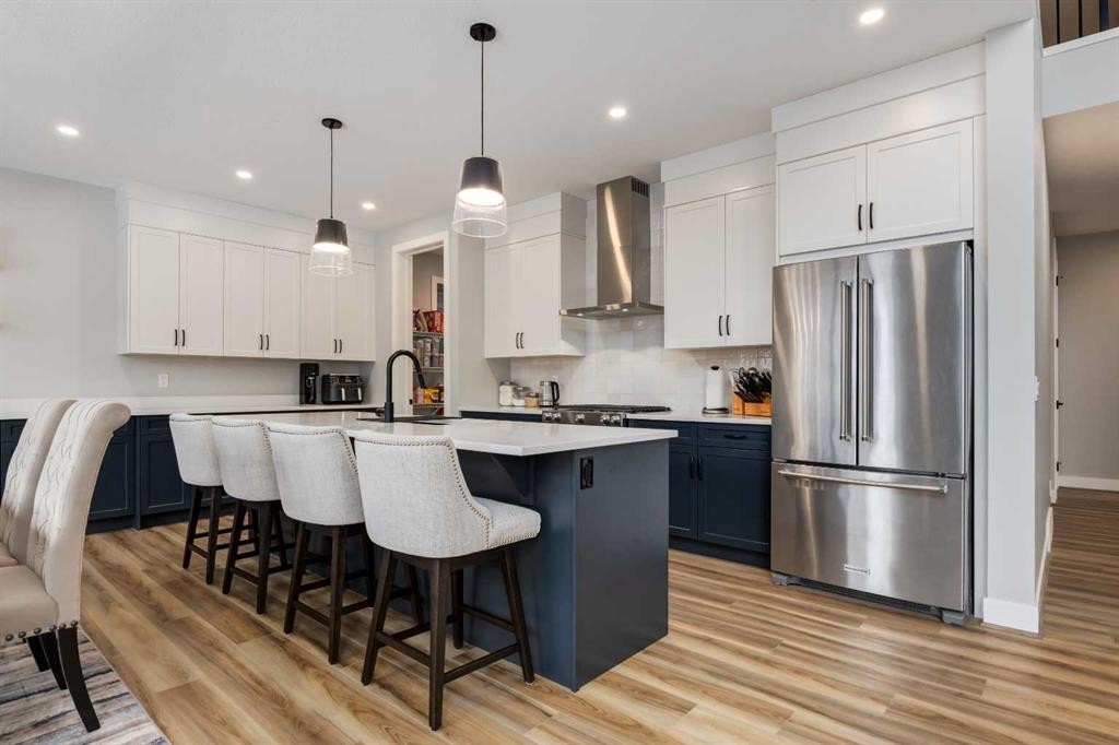 18 South Shore Bay, Chestermere, AB - Indoor Photo Showing Kitchen With Stainless Steel Kitchen With Upgraded Kitchen