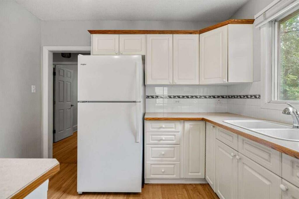 2307 Richmond Road Sw, Calgary, AB - Indoor Photo Showing Kitchen With Double Sink
