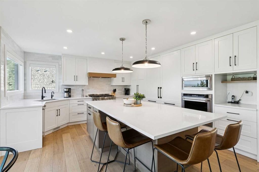22 Patrick View Sw, Calgary, AB - Indoor Photo Showing Kitchen With Upgraded Kitchen