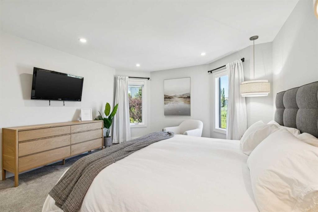 22 Patrick View Sw, Calgary, AB - Indoor Photo Showing Bedroom