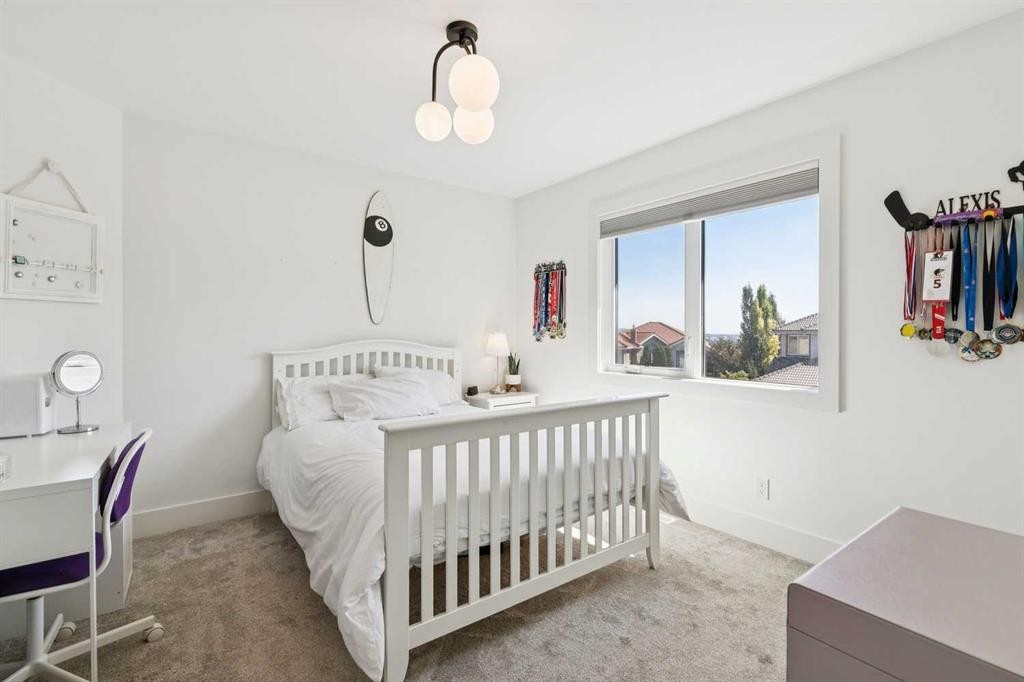 22 Patrick View Sw, Calgary, AB - Indoor Photo Showing Bedroom