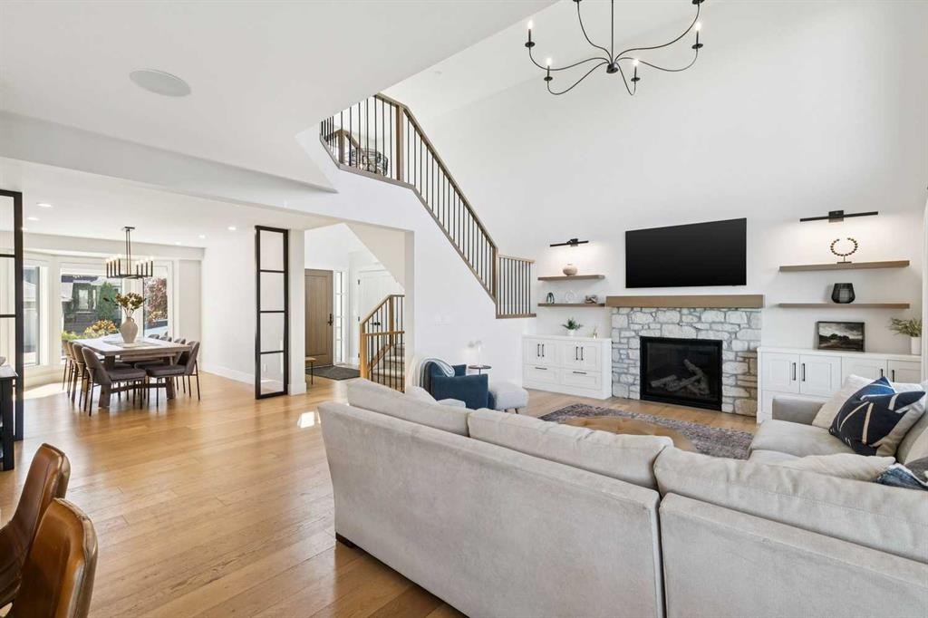 22 Patrick View Sw, Calgary, AB - Indoor Photo Showing Living Room With Fireplace