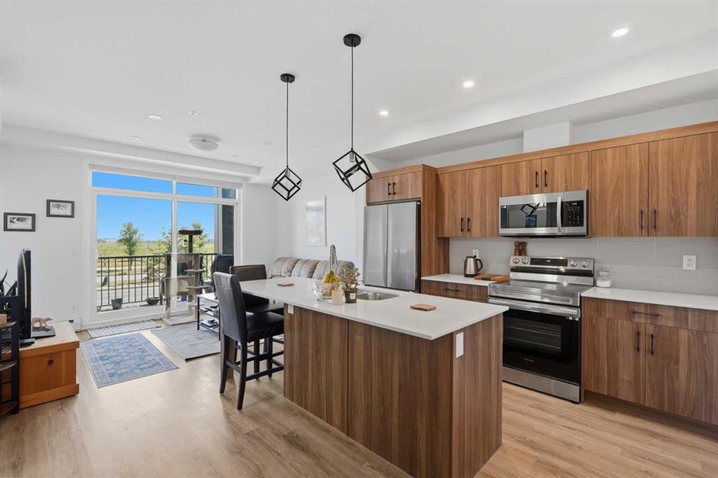 5112-200 Seton Circle Se, Calgary, AB - Indoor Photo Showing Kitchen With Stainless Steel Kitchen