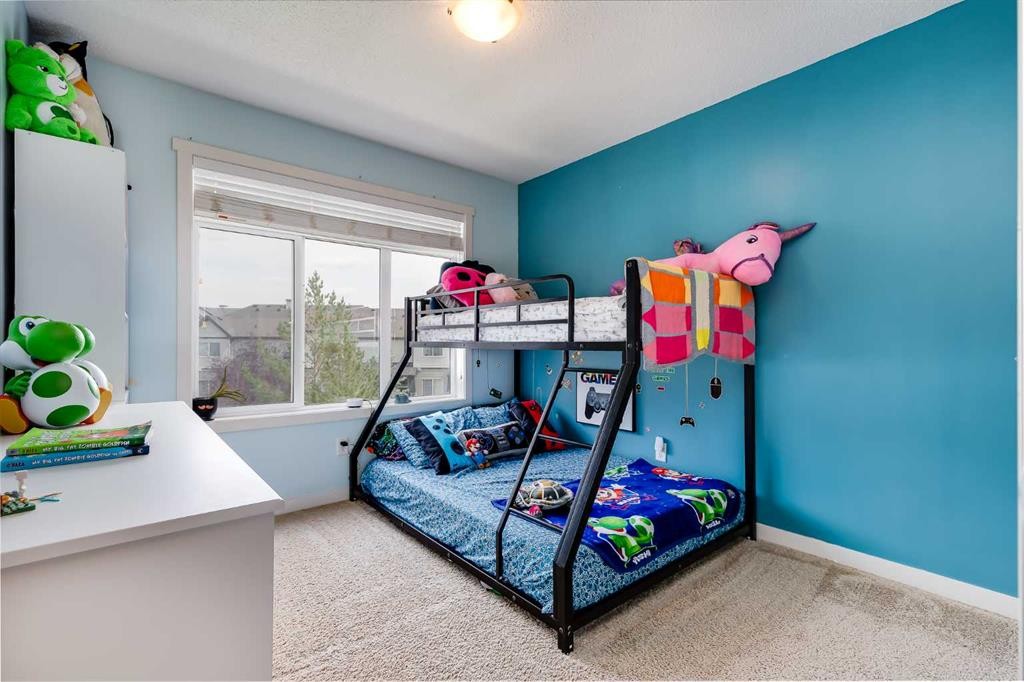72 Copperpond Landing Se, Calgary, AB - Indoor Photo Showing Bedroom
