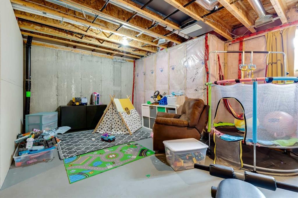 72 Copperpond Landing Se, Calgary, AB - Indoor Photo Showing Basement
