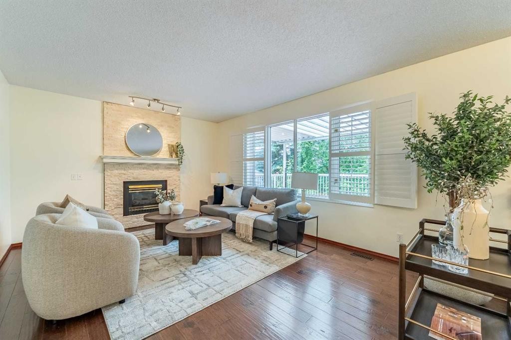 46 Mountain Park Drive Se, Calgary, AB - Indoor Photo Showing Living Room With Fireplace
