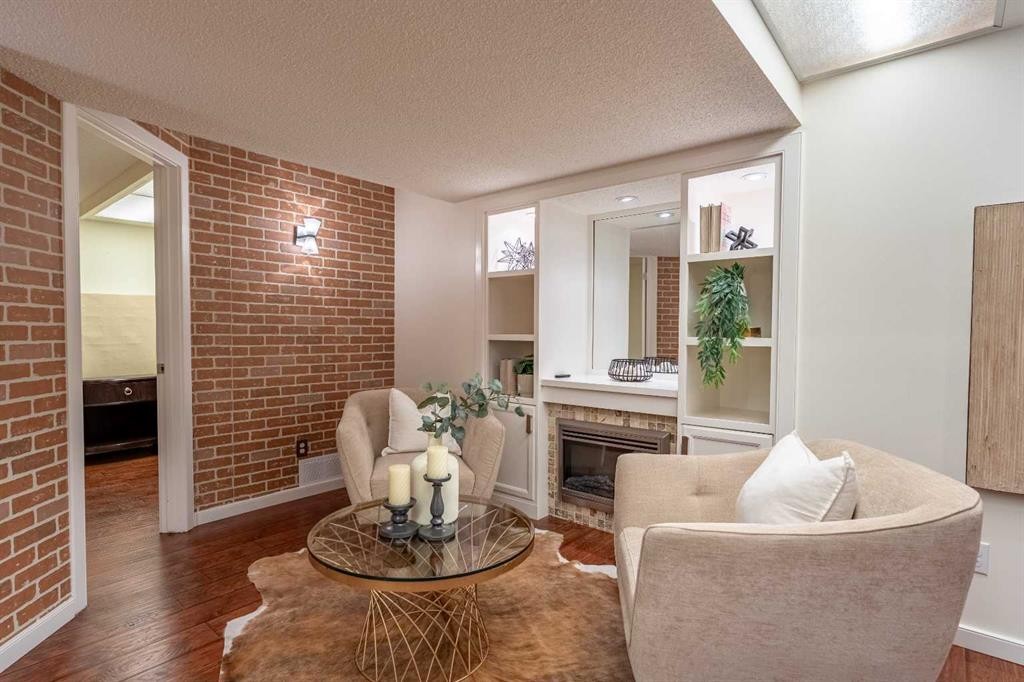 46 Mountain Park Drive Se, Calgary, AB - Indoor Photo Showing Living Room With Fireplace
