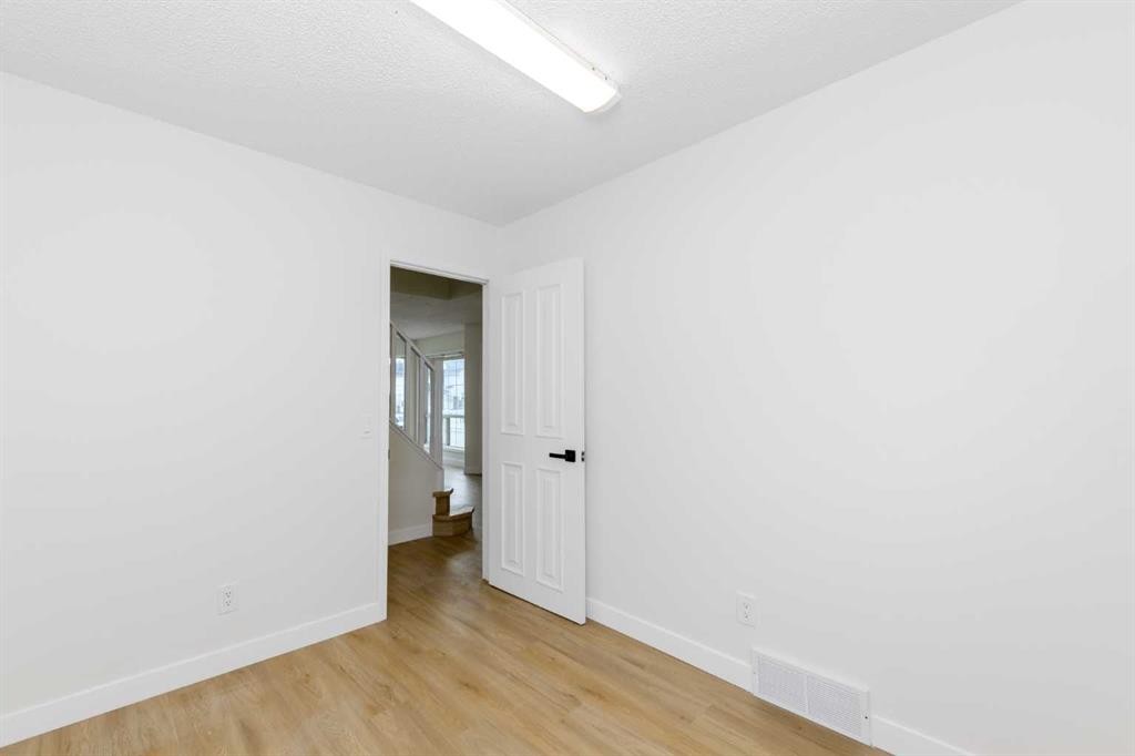 28 Coral Reef Link Ne, Calgary, AB - Indoor Photo Showing Other Room