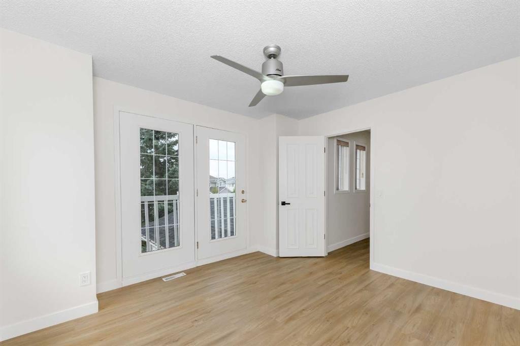 28 Coral Reef Link Ne, Calgary, AB - Indoor Photo Showing Other Room