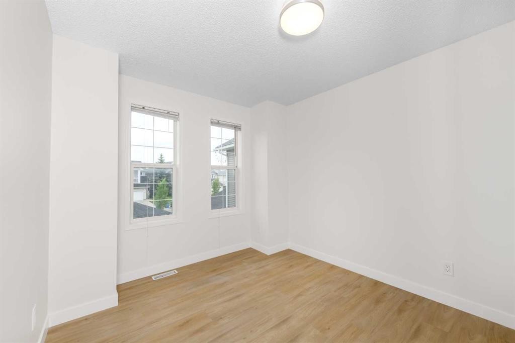 28 Coral Reef Link Ne, Calgary, AB - Indoor Photo Showing Other Room
