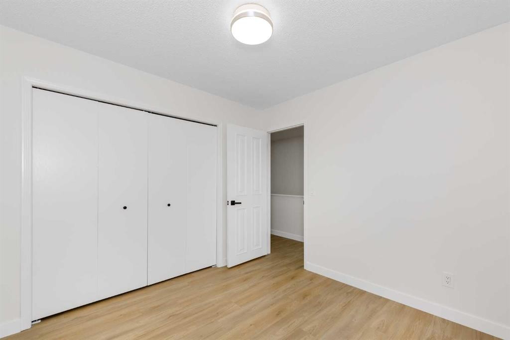 28 Coral Reef Link Ne, Calgary, AB - Indoor Photo Showing Other Room