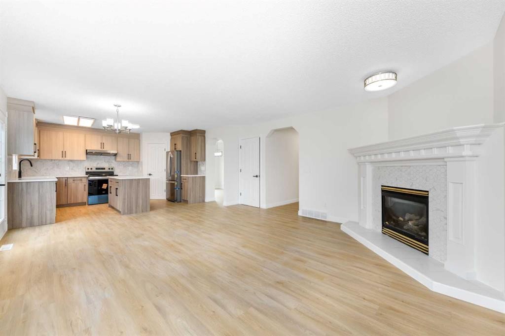 28 Coral Reef Link Ne, Calgary, AB - Indoor With Fireplace