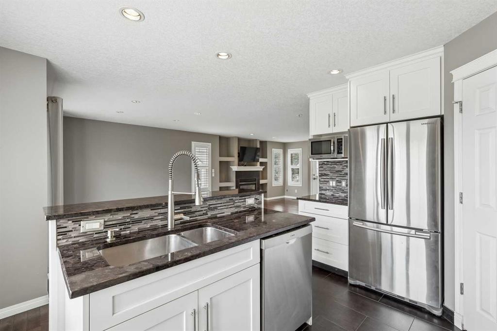 139 Hidden Creek Gardens Nw, Calgary, AB - Indoor Photo Showing Kitchen With Stainless Steel Kitchen With Double Sink