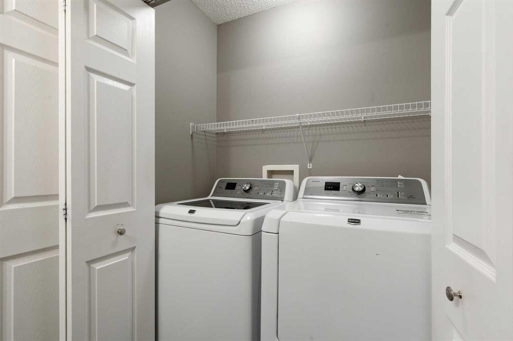 139 Hidden Creek Gardens Nw, Calgary, AB - Indoor Photo Showing Laundry Room