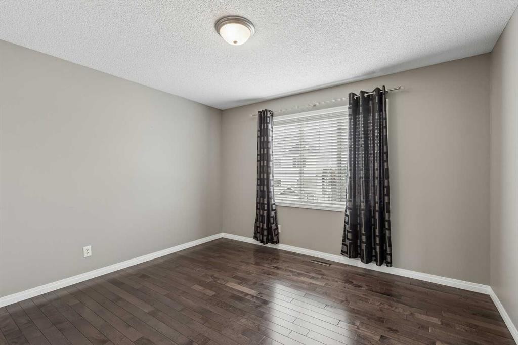 139 Hidden Creek Gardens Nw, Calgary, AB - Indoor Photo Showing Other Room