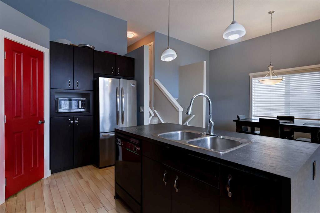 6 Elgin Meadows Road Se, Calgary, AB - Indoor Photo Showing Kitchen With Double Sink
