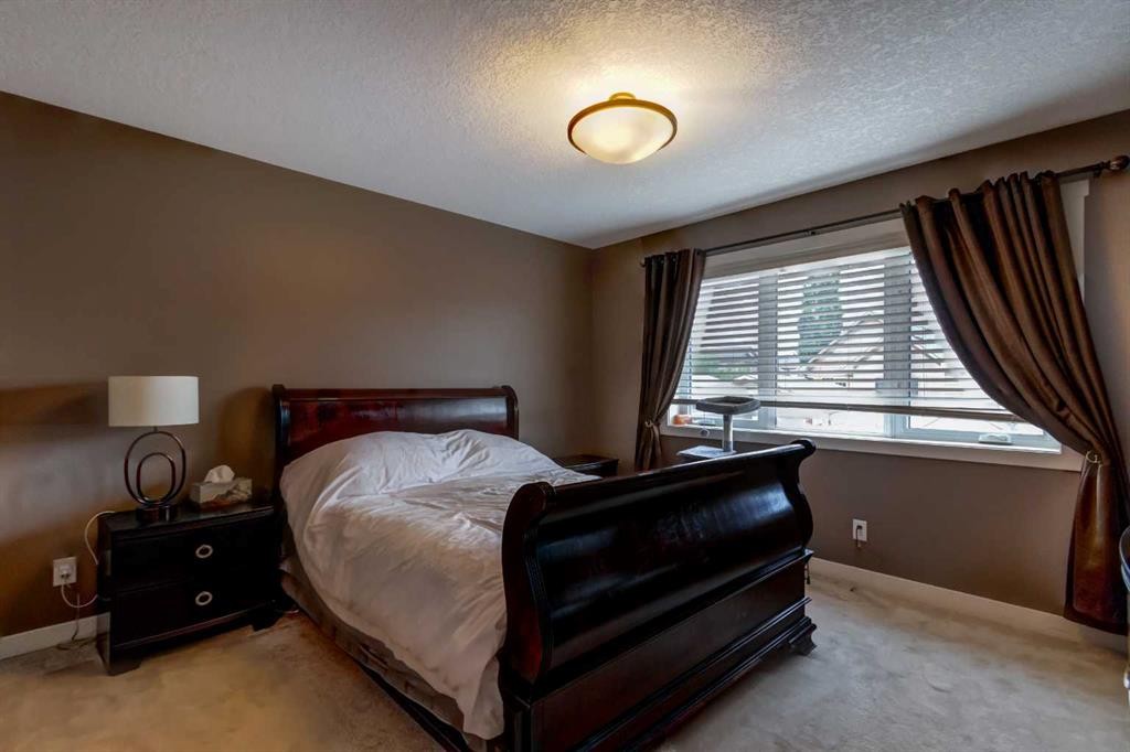 6 Elgin Meadows Road Se, Calgary, AB - Indoor Photo Showing Bedroom