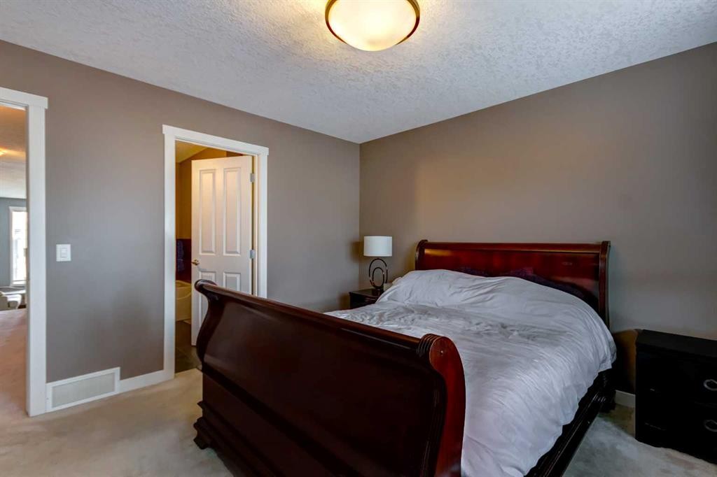 6 Elgin Meadows Road Se, Calgary, AB - Indoor Photo Showing Bedroom