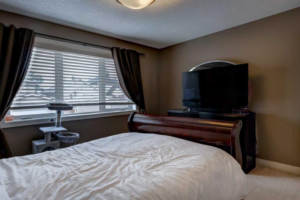 6 Elgin Meadows Road Se, Calgary, AB - Indoor Photo Showing Bedroom