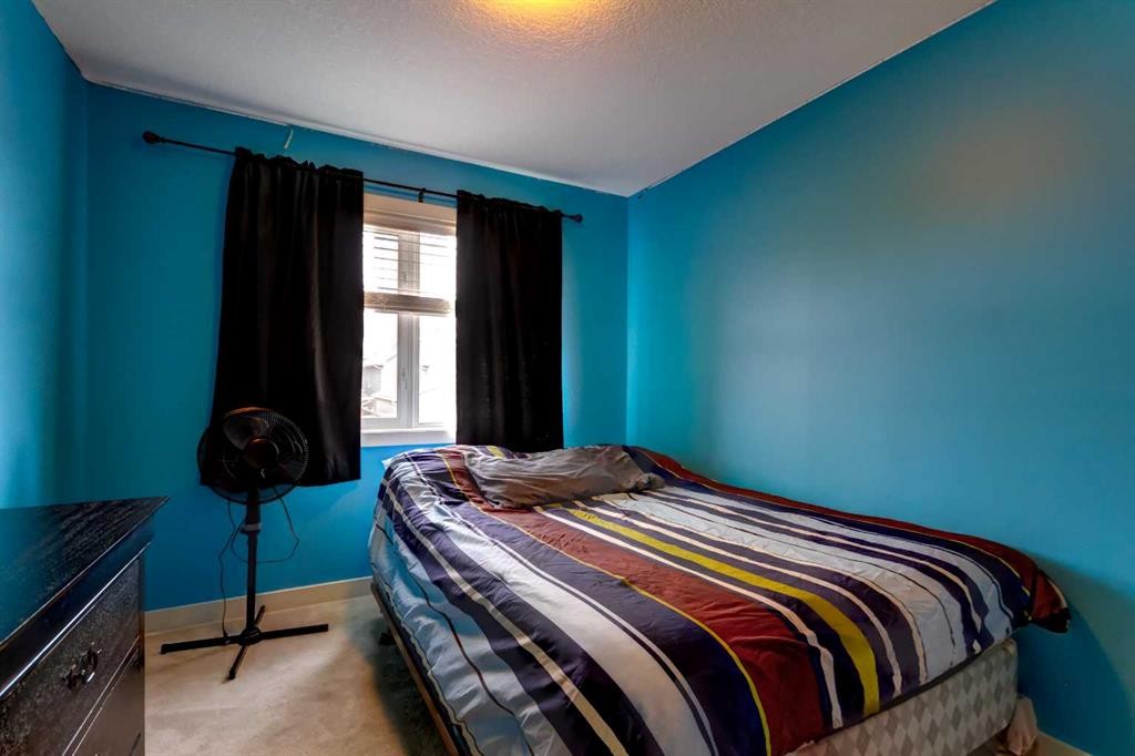 6 Elgin Meadows Road Se, Calgary, AB - Indoor Photo Showing Bedroom
