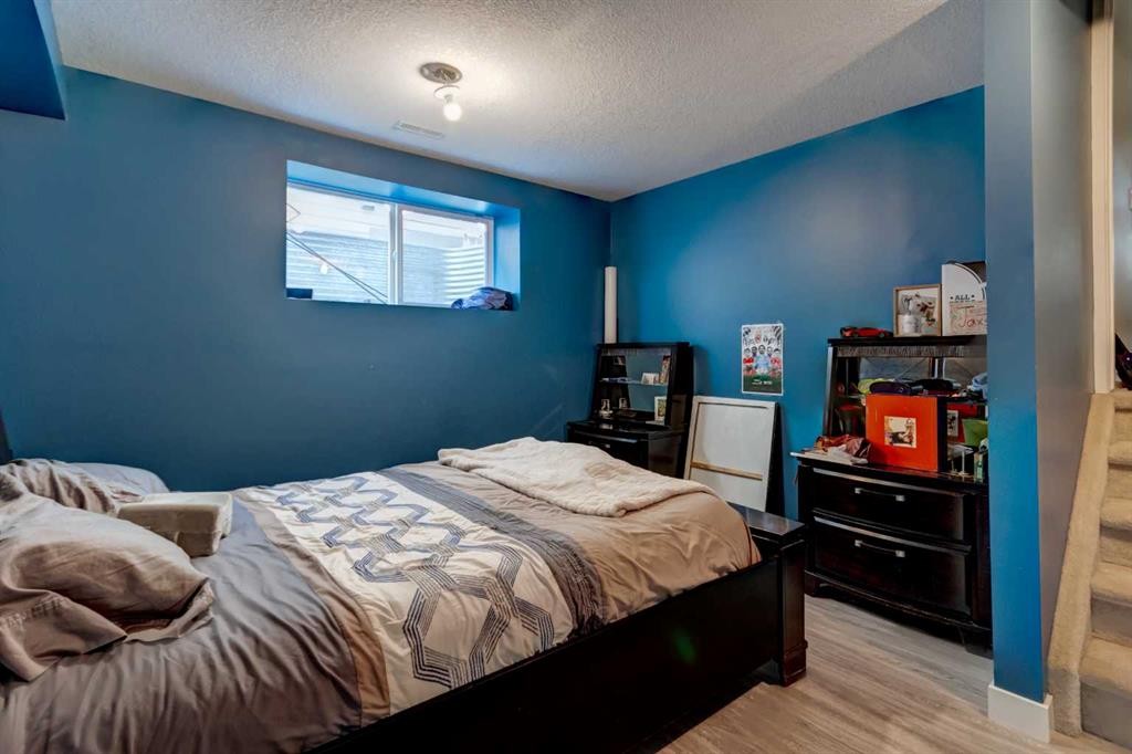 6 Elgin Meadows Road Se, Calgary, AB - Indoor Photo Showing Bedroom