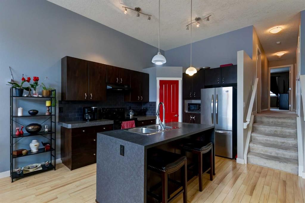 6 Elgin Meadows Road Se, Calgary, AB - Indoor Photo Showing Kitchen With Double Sink