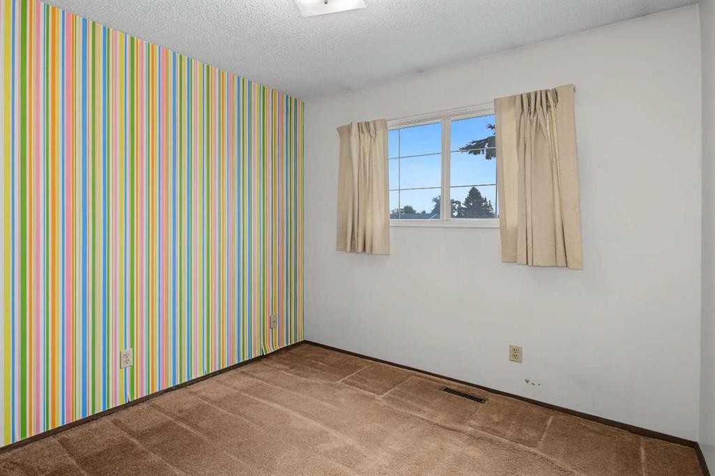 75-175 Manora Place Ne, Calgary, AB - Indoor Photo Showing Other Room
