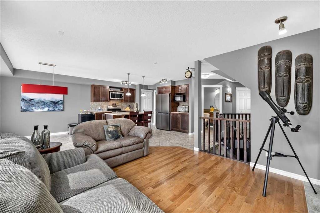 128 Cranberry Circle Se, Calgary, AB - Indoor Photo Showing Living Room