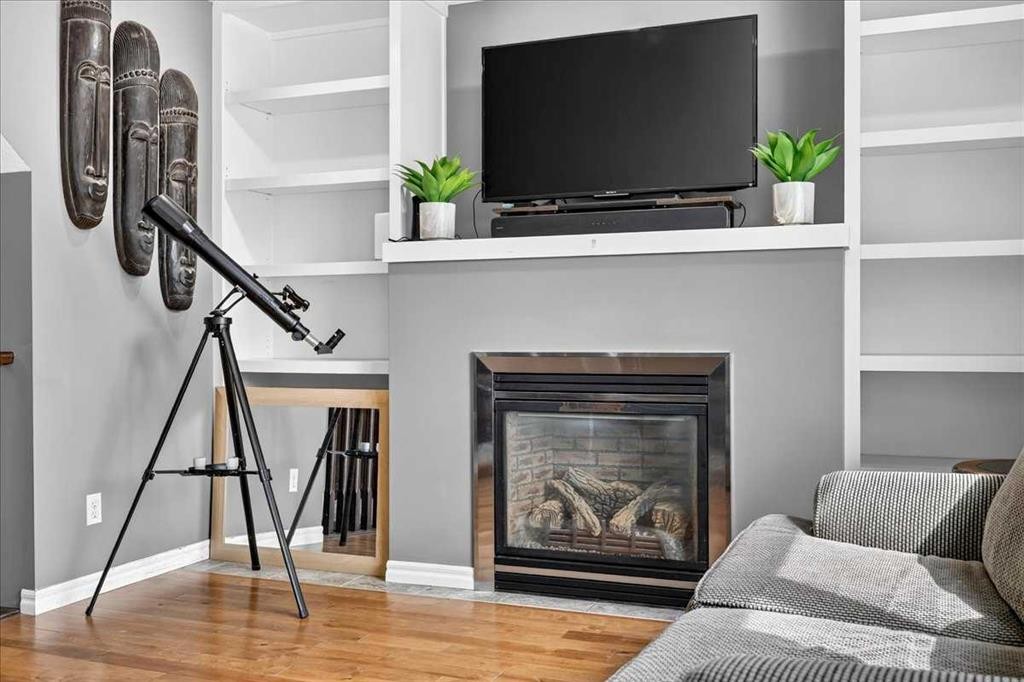 128 Cranberry Circle Se, Calgary, AB - Indoor With Fireplace