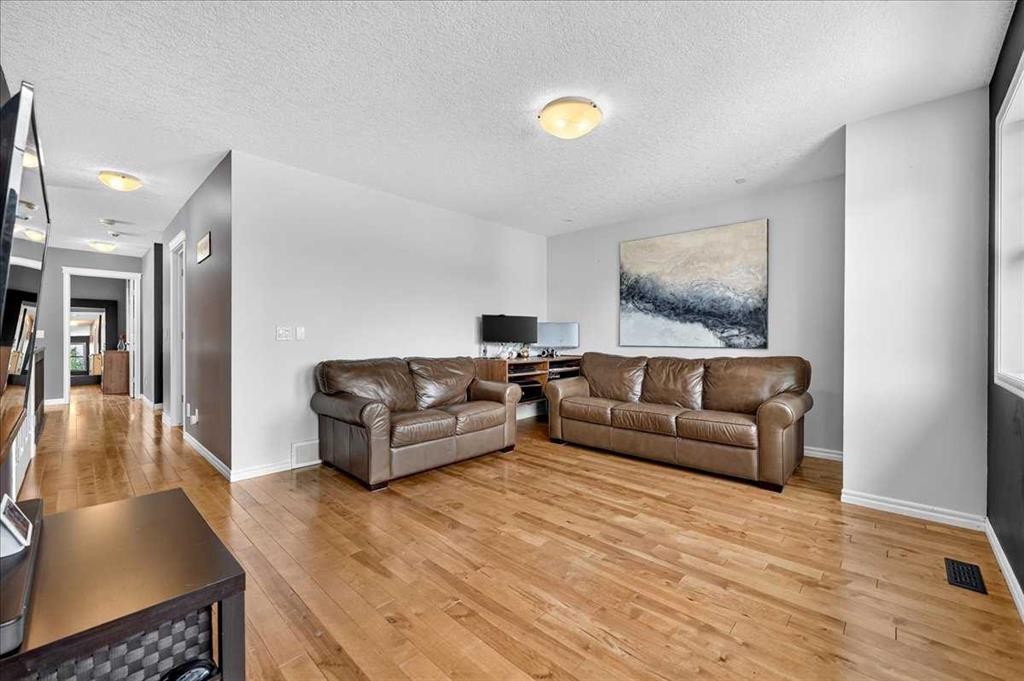 128 Cranberry Circle Se, Calgary, AB - Indoor Photo Showing Living Room