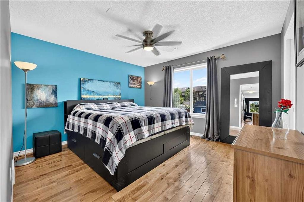 128 Cranberry Circle Se, Calgary, AB - Indoor Photo Showing Bedroom