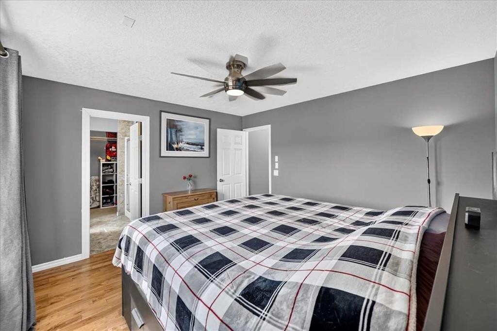 128 Cranberry Circle Se, Calgary, AB - Indoor Photo Showing Bedroom