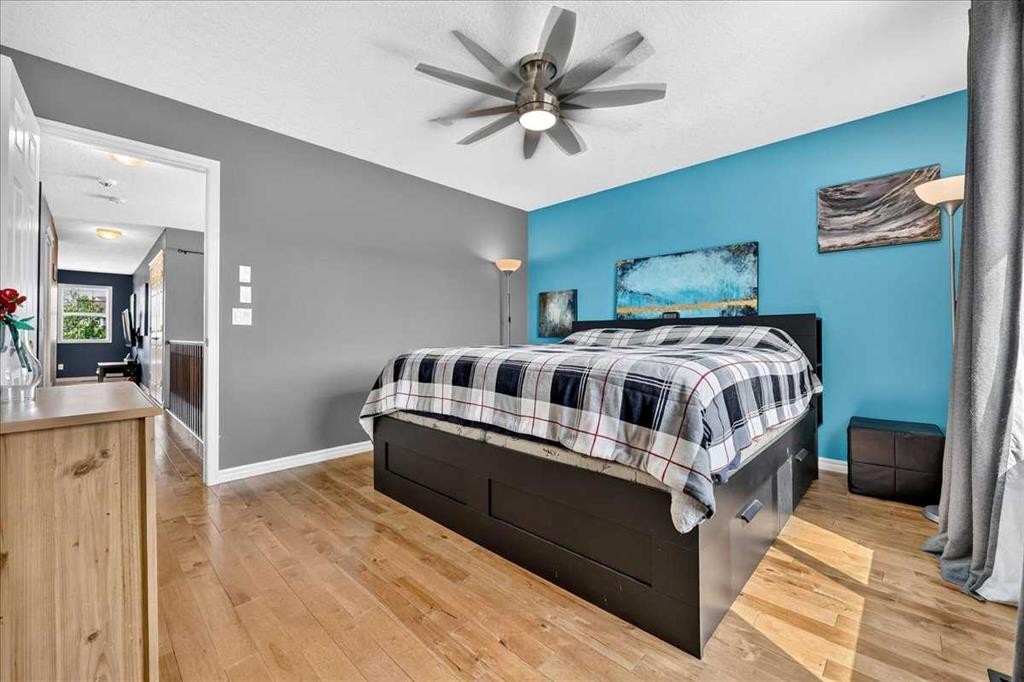 128 Cranberry Circle Se, Calgary, AB - Indoor Photo Showing Bedroom