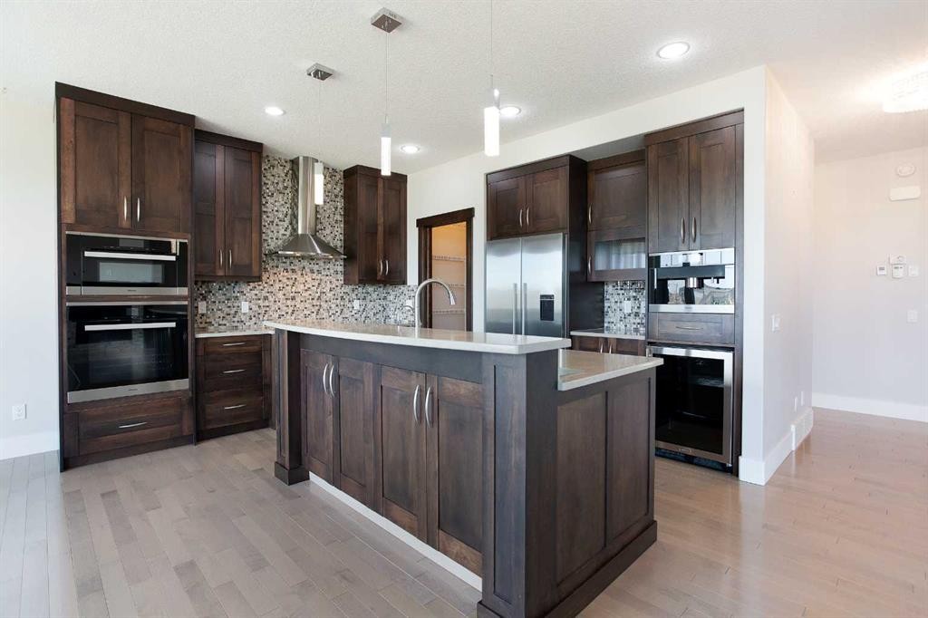 49 Cimarron Springs Circle, Okotoks, AB - Indoor Photo Showing Kitchen With Upgraded Kitchen