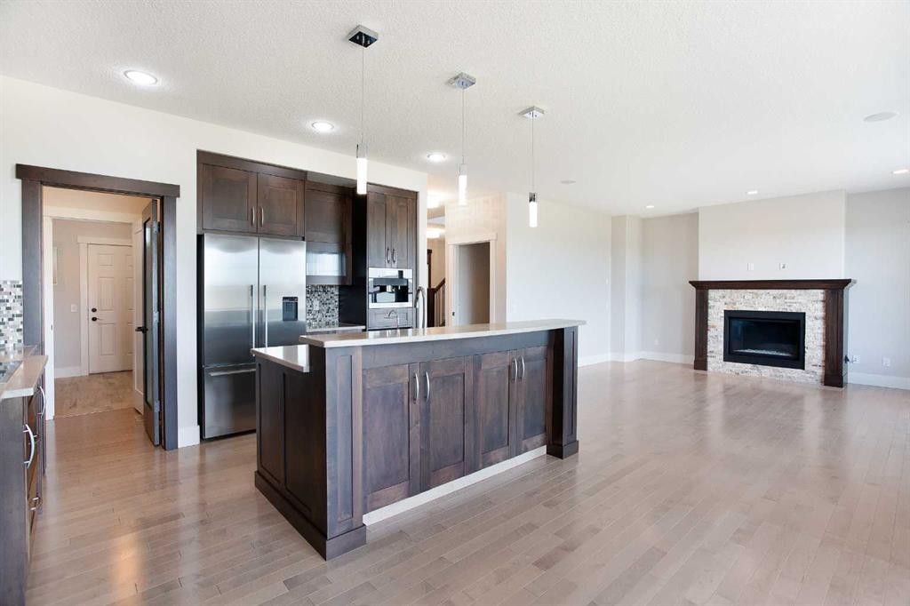 49 Cimarron Springs Circle, Okotoks, AB - Indoor Photo Showing Other Room With Fireplace