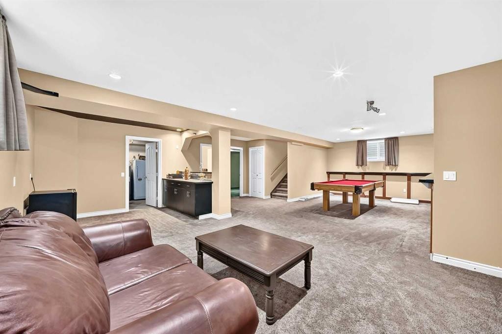 212 Aspenmere Close, Chestermere, AB - Indoor Photo Showing Living Room