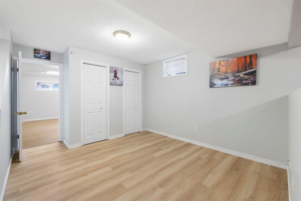 76 Douglas Ridge Close Se, Calgary, AB - Indoor Photo Showing Other Room
