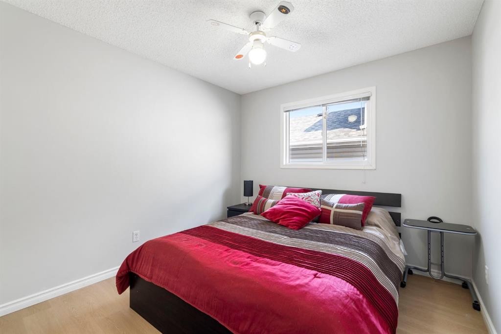 76 Douglas Ridge Close Se, Calgary, AB - Indoor Photo Showing Bedroom