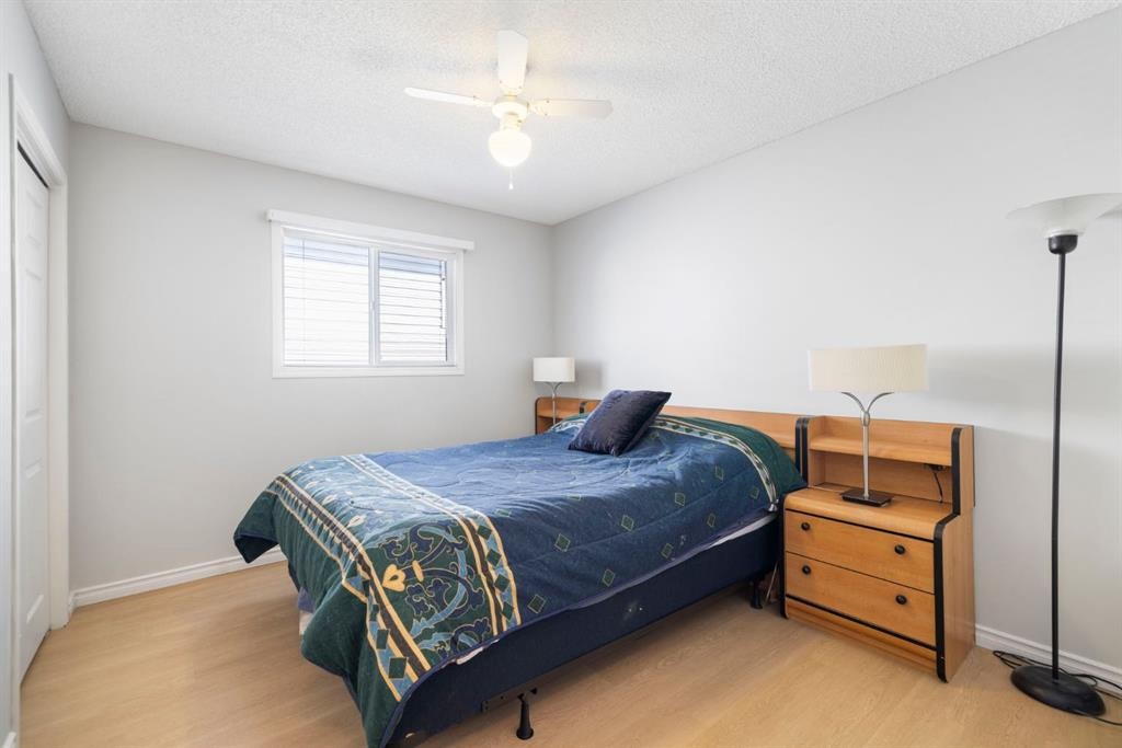 76 Douglas Ridge Close Se, Calgary, AB - Indoor Photo Showing Bedroom