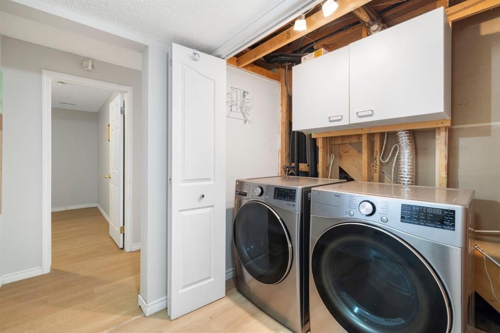 76 Douglas Ridge Close Se, Calgary, AB - Indoor Photo Showing Laundry Room