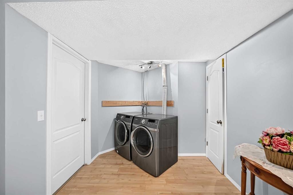 65 Tuscarora Place Nw, Calgary, AB - Indoor Photo Showing Laundry Room