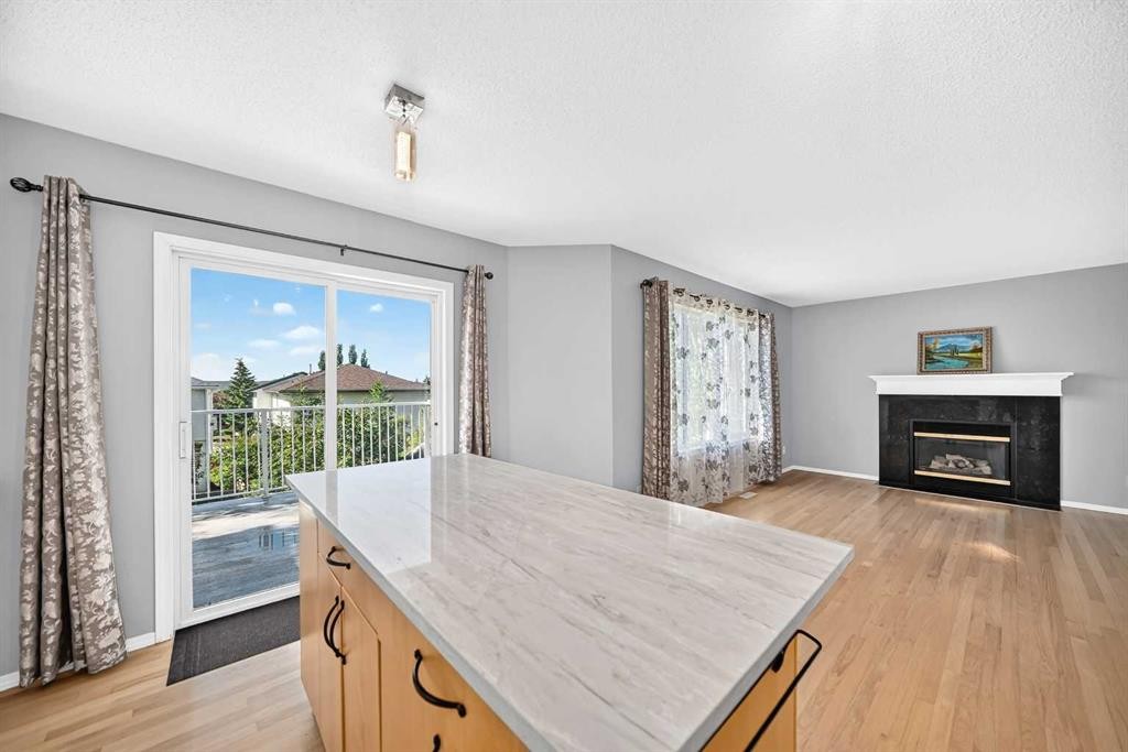 65 Tuscarora Place Nw, Calgary, AB - Indoor With Fireplace